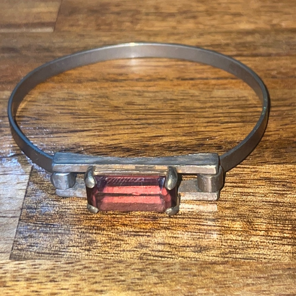 Vintage Avon bracelet silver tone and amethyst colored stone.